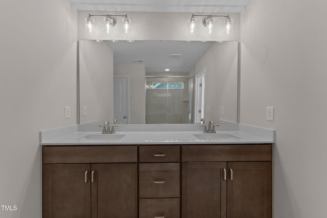 bathroom with vanity and walk in shower