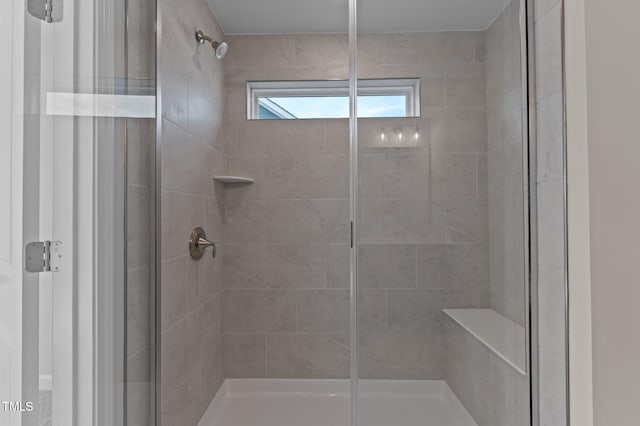 bathroom featuring an enclosed shower