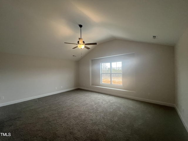 bonus room featuring lofted ceiling, carpet floors, and ceiling fan