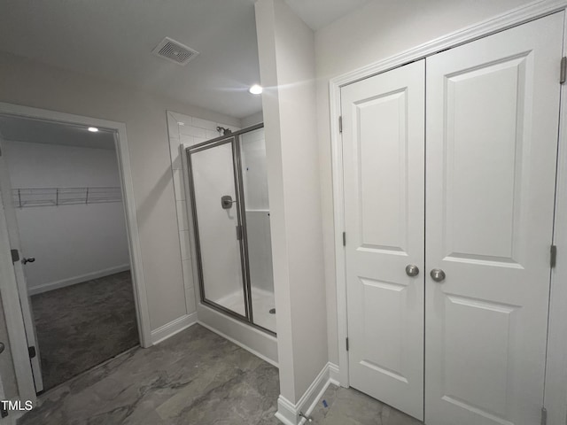 bathroom with walk in shower