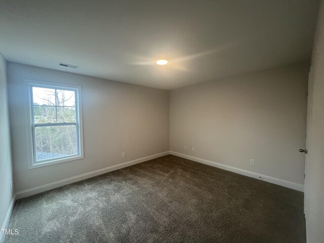 view of carpeted spare room