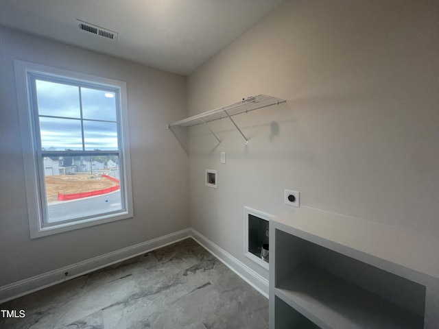 laundry room with electric dryer hookup and washer hookup