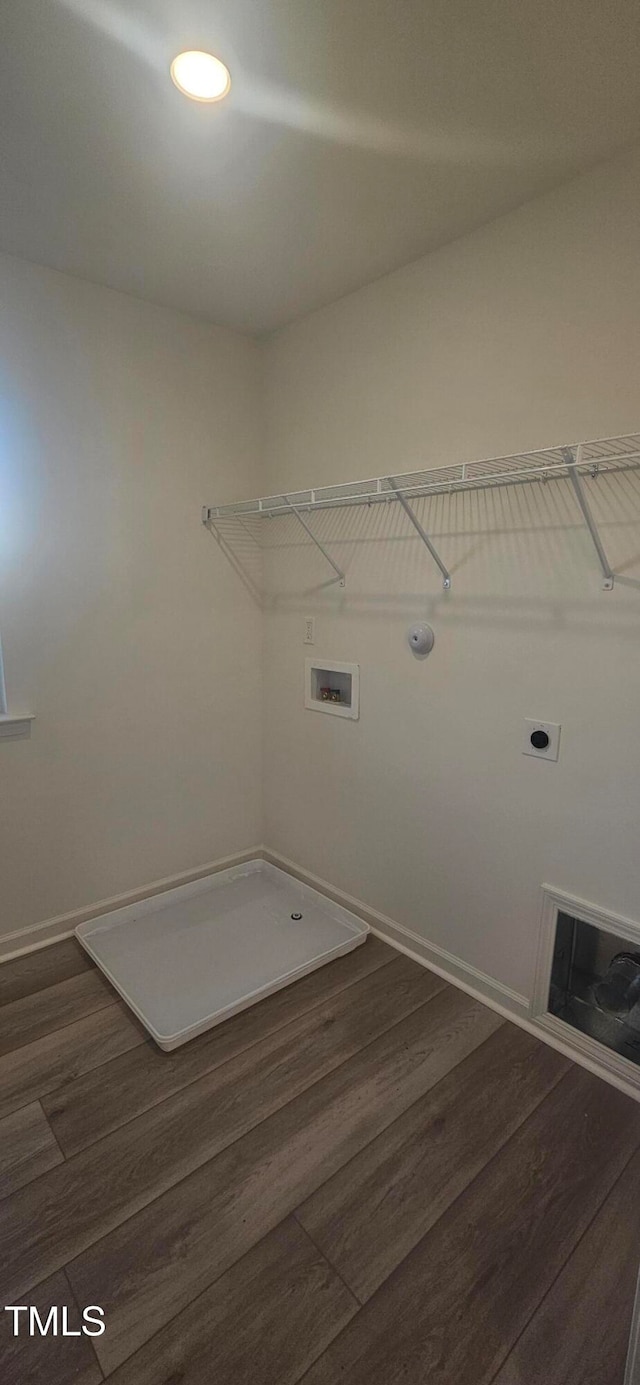 washroom with washer hookup, laundry area, electric dryer hookup, and dark wood-style flooring