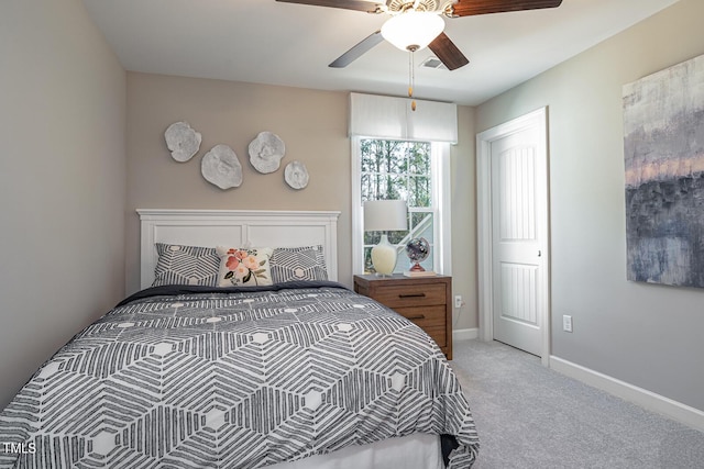 bedroom featuring a ceiling fan, carpet, visible vents, and baseboards