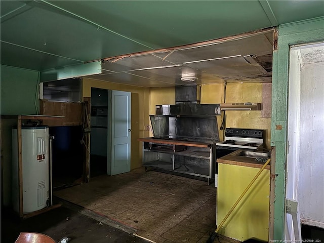 kitchen featuring electric water heater and range hood