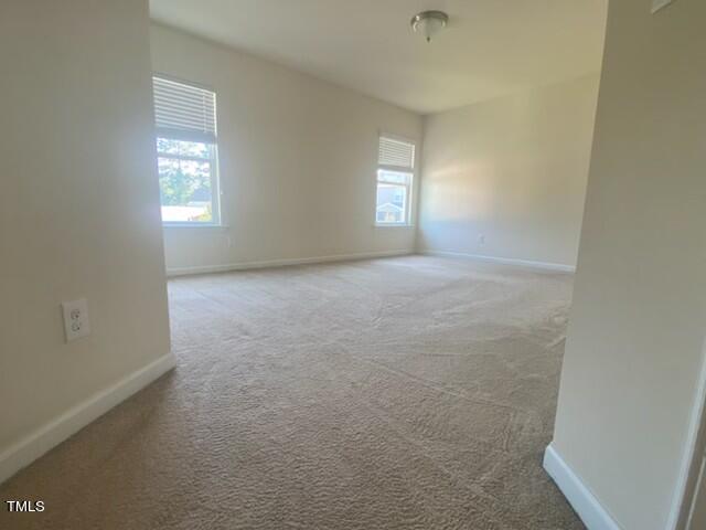 empty room with carpet floors