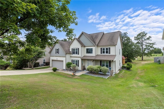 view of front of house with a front yard and a garage