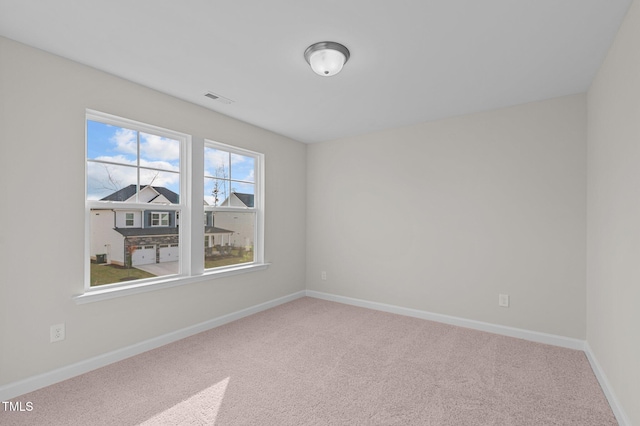 view of carpeted spare room