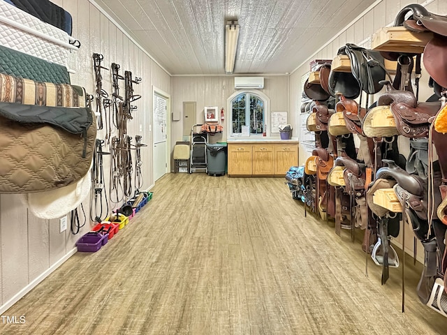 view of horse barn with a wall mounted AC