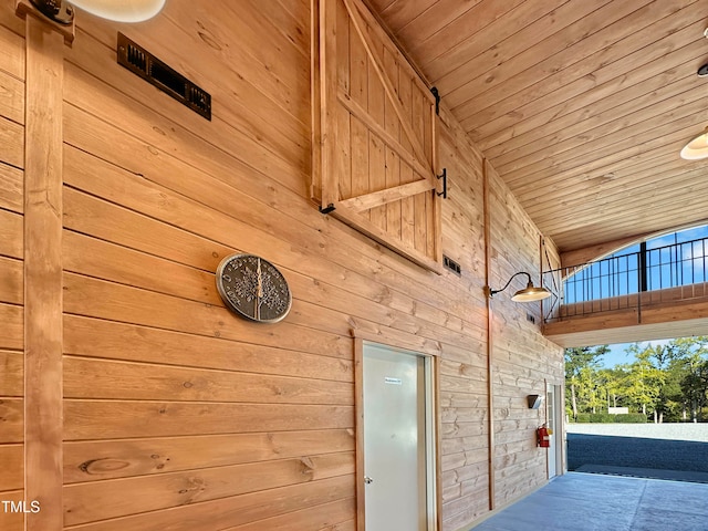 details featuring wooden walls and wooden ceiling