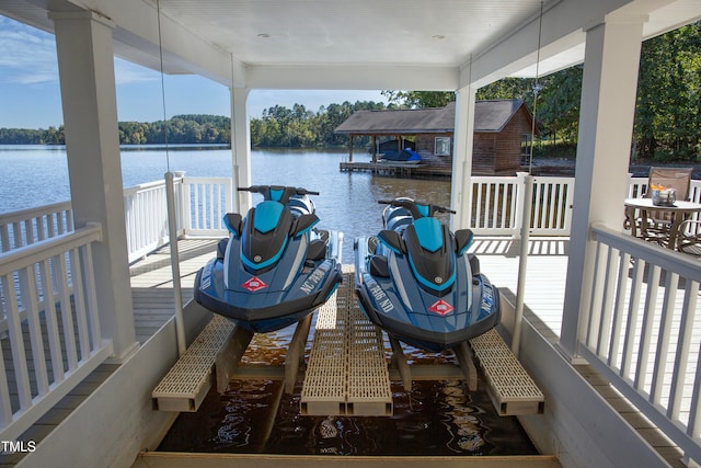 view of dock with a water view