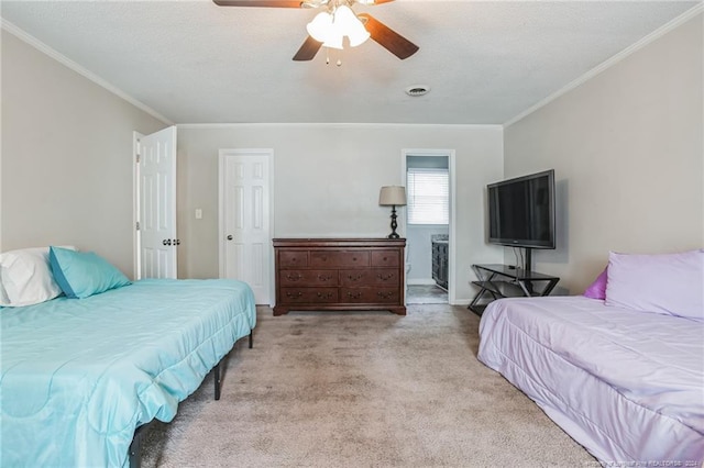 carpeted bedroom featuring crown molding and ceiling fan