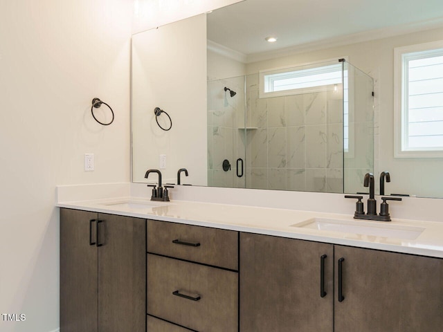 205 Wash Hollow Dr, Wendell, NC 27591 - bathroom featuring ornamental molding, vanity, and an enclosed shower