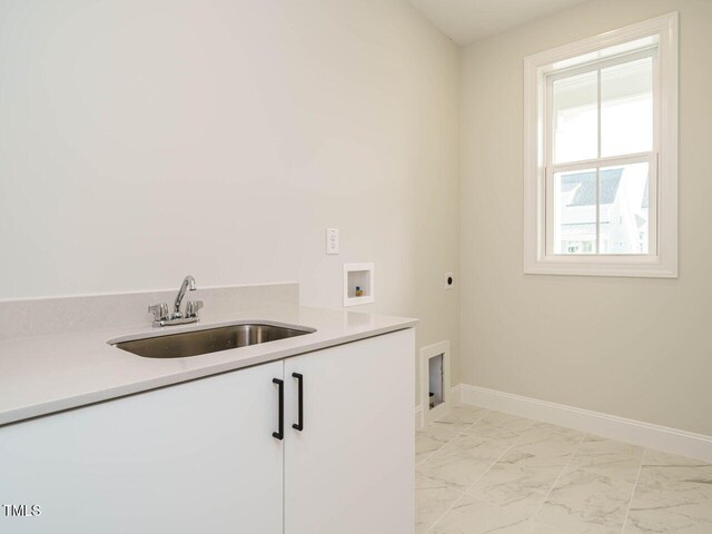 205 Wash Hollow Dr, Wendell, NC 27591 - washroom with cabinets, washer hookup, sink, and electric dryer hookup