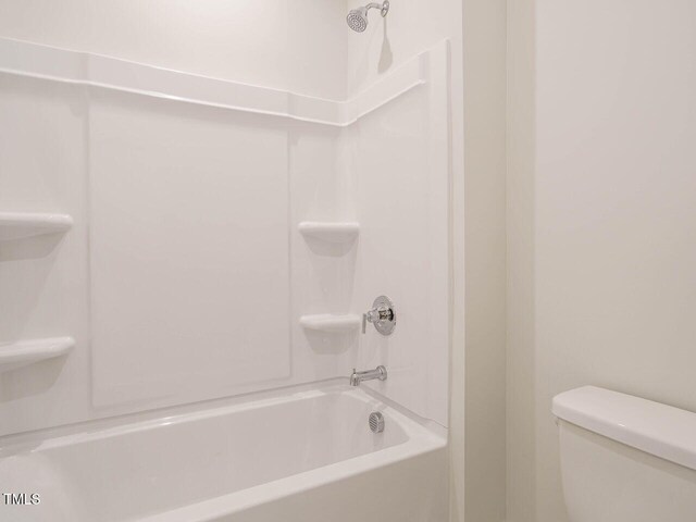 205 Wash Hollow Dr, Wendell, NC 27591 - bathroom featuring shower / washtub combination and toilet