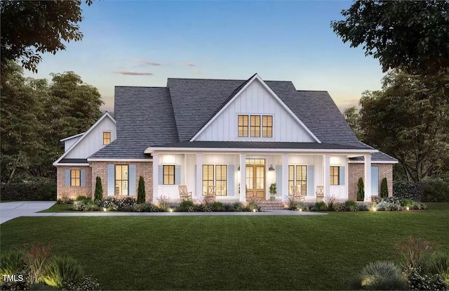 6604 Deermont Ct, Gibsonville, NC 27249 - view of front facade featuring covered porch and a yard