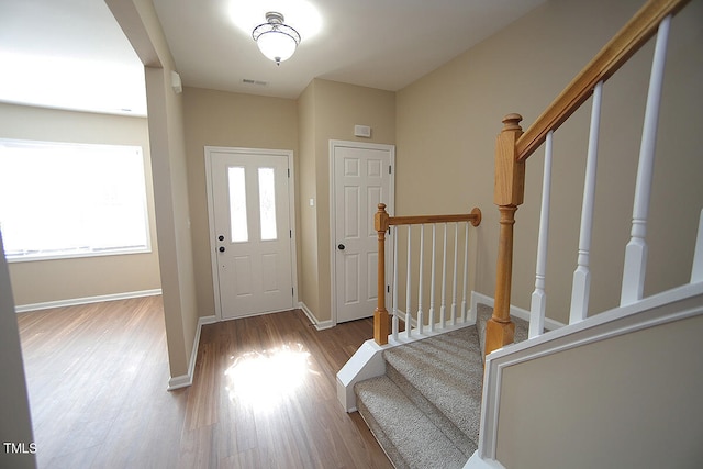 foyer with hardwood / wood-style floors