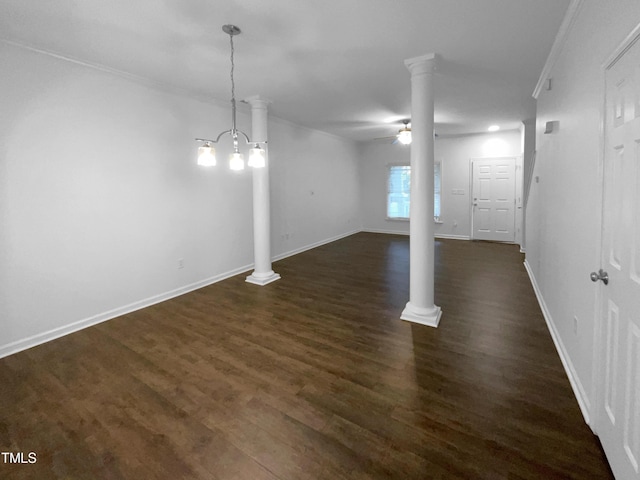 basement with ceiling fan, ornamental molding, and dark hardwood / wood-style floors