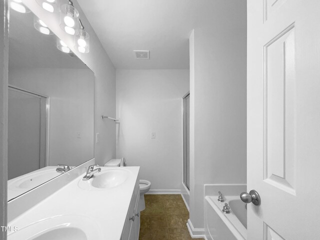 full bathroom featuring toilet, tile patterned flooring, shower with separate bathtub, and vanity