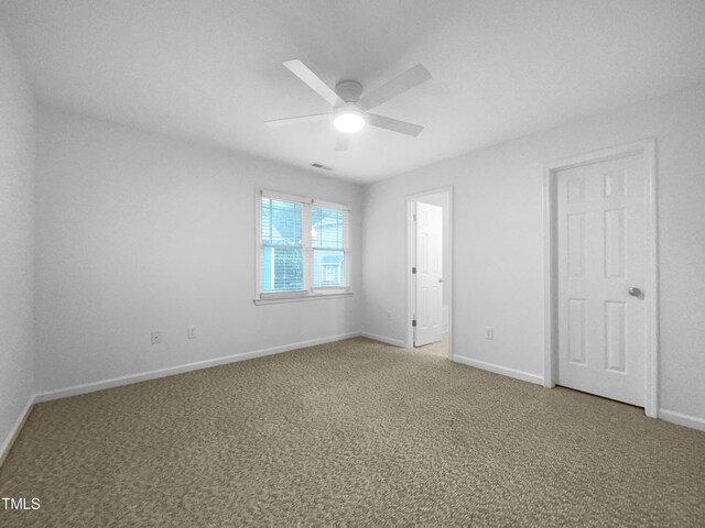 unfurnished bedroom with carpet flooring and ceiling fan