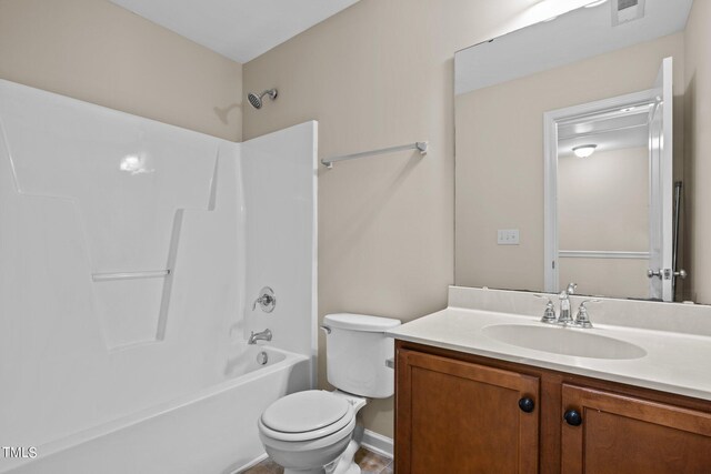 full bathroom with shower / bath combination, toilet, and vanity