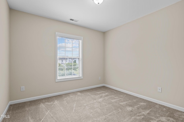 view of carpeted spare room