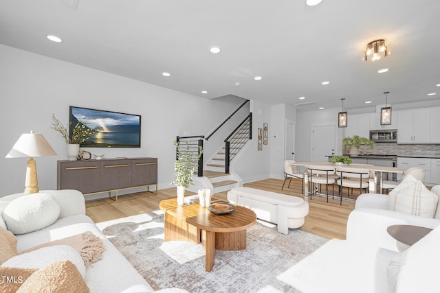 living room with light hardwood / wood-style floors