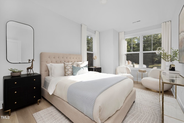 bedroom featuring light hardwood / wood-style floors