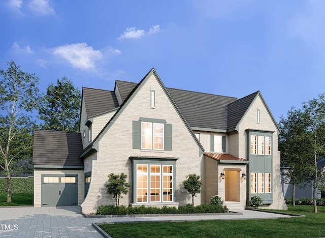 view of front facade with a garage and a front yard