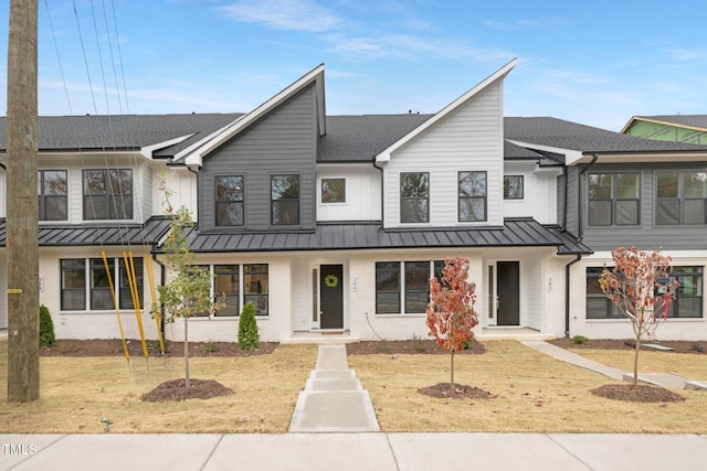 view of front of home with a front lawn