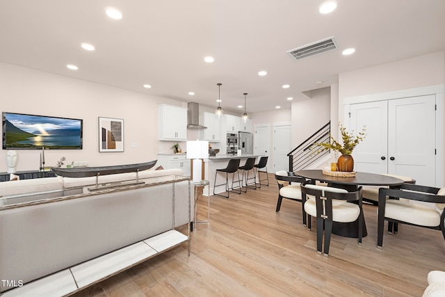 living room featuring light wood-type flooring