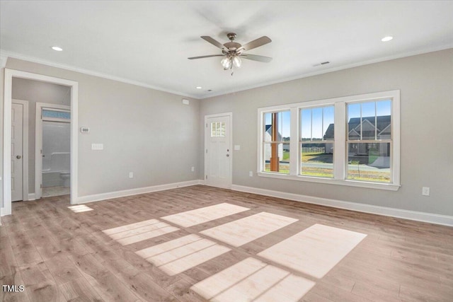 interior space with recessed lighting, crown molding, light wood-style flooring, and baseboards