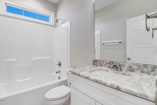 full bath with shower / washtub combination, vanity, and toilet