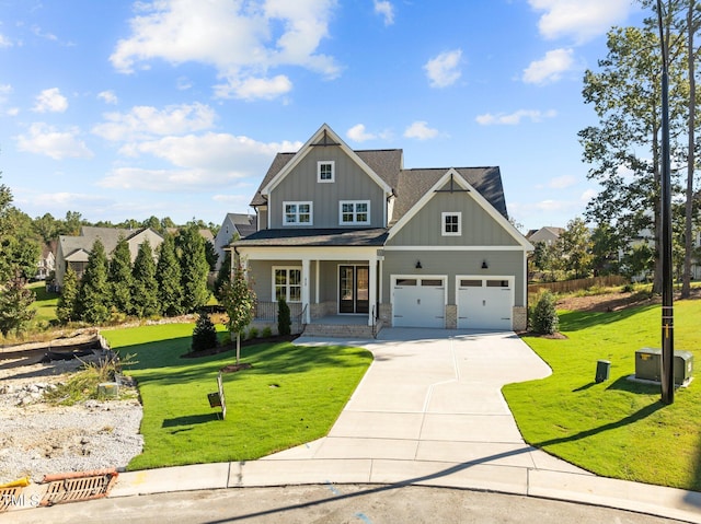 craftsman inspired home with a garage, covered porch, and a front lawn