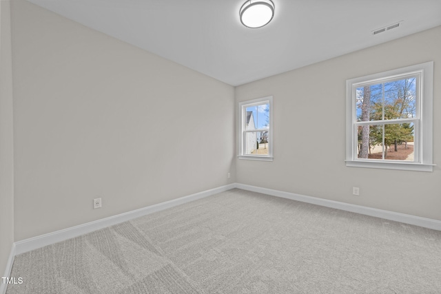 view of carpeted spare room