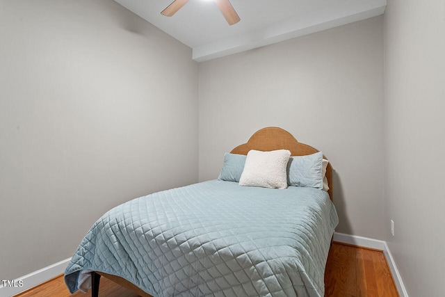 bedroom with hardwood / wood-style flooring and ceiling fan