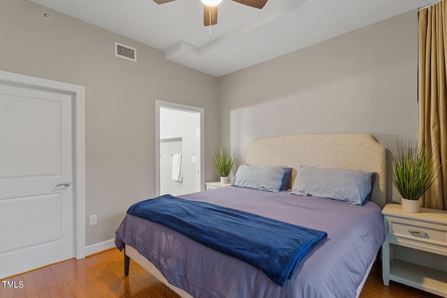 bedroom featuring hardwood / wood-style flooring and ceiling fan