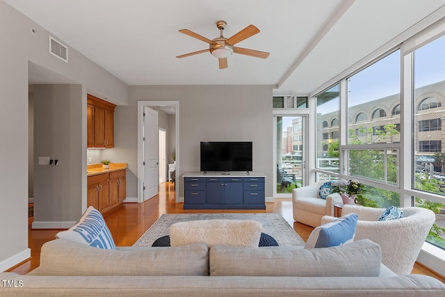 living room featuring hardwood / wood-style floors and plenty of natural light