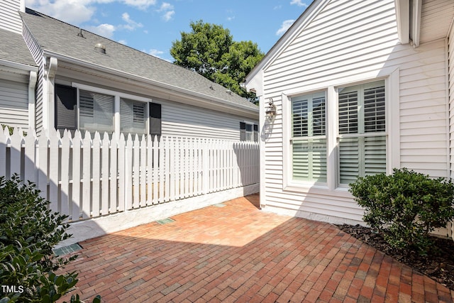 view of patio with fence