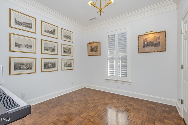 unfurnished room with a notable chandelier, ornamental molding, visible vents, and baseboards