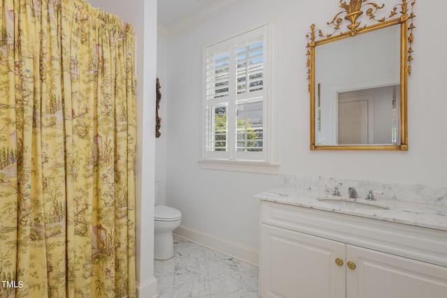 bathroom with vanity, toilet, tile patterned flooring, and ornamental molding