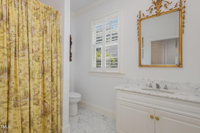 bathroom featuring marble finish floor, toilet, ornamental molding, vanity, and baseboards