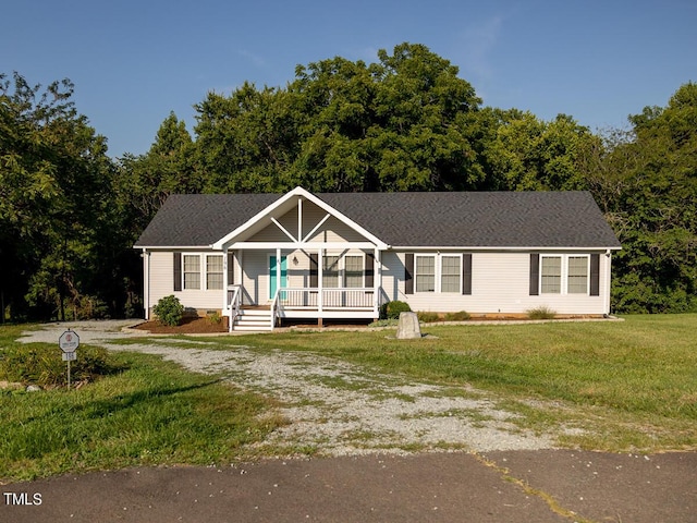 view of front of house featuring a front lawn and a porch