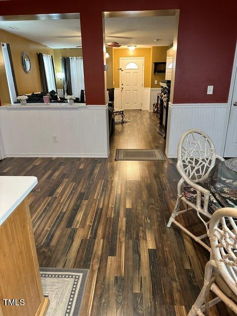 interior space with dark hardwood / wood-style floors