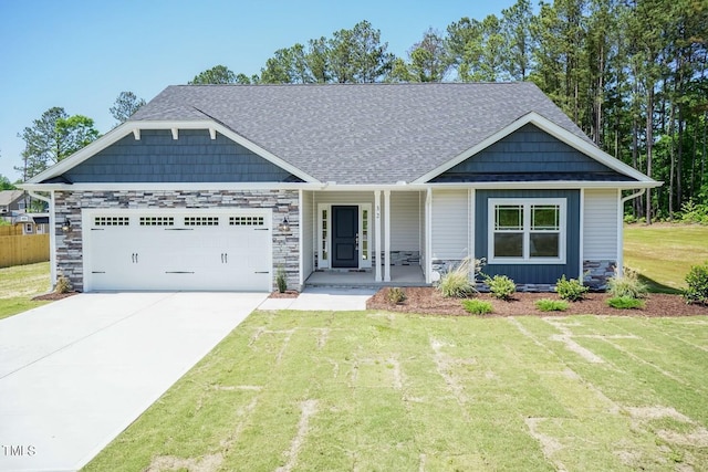 craftsman-style house with a front lawn, a garage, and covered porch