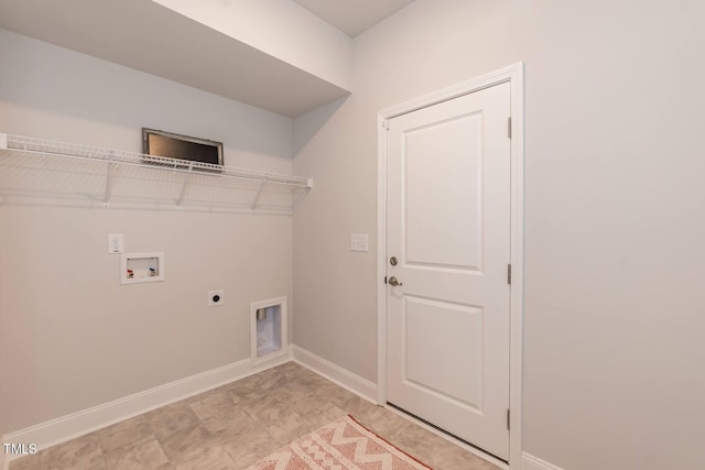 clothes washing area with laundry area, baseboards, washer hookup, and hookup for an electric dryer