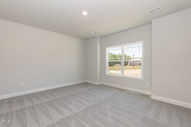 157 Newport Lndg Lot 95, Garner, NC 27529 - carpeted spare room with baseboards and recessed lighting
