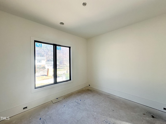 empty room with baseboards