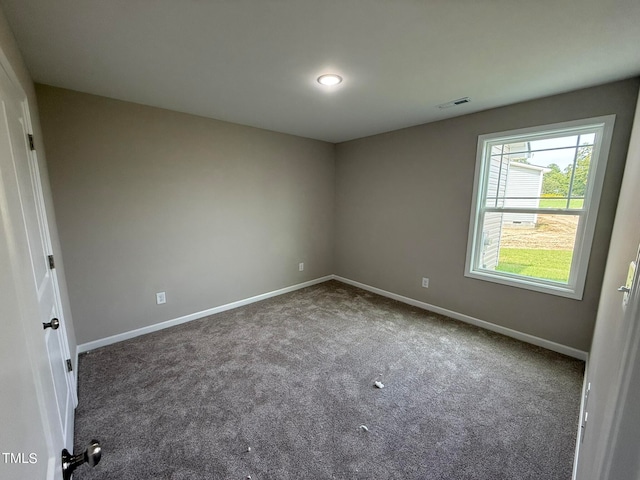 view of carpeted spare room