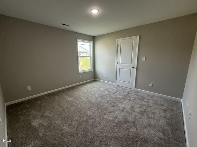 view of carpeted spare room